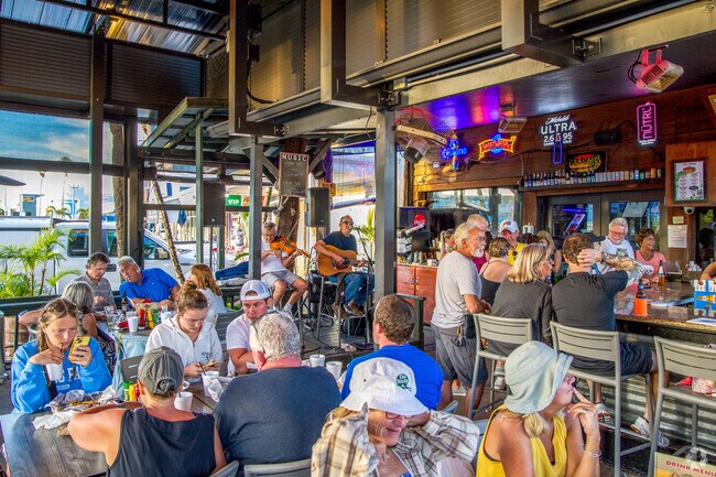 Hop of the bridge into treasure island & check out the live entertainment at Ricky T's.