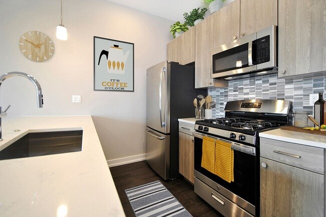 3rd Floor w/ Custom Backsplash - Light Wood Finish
