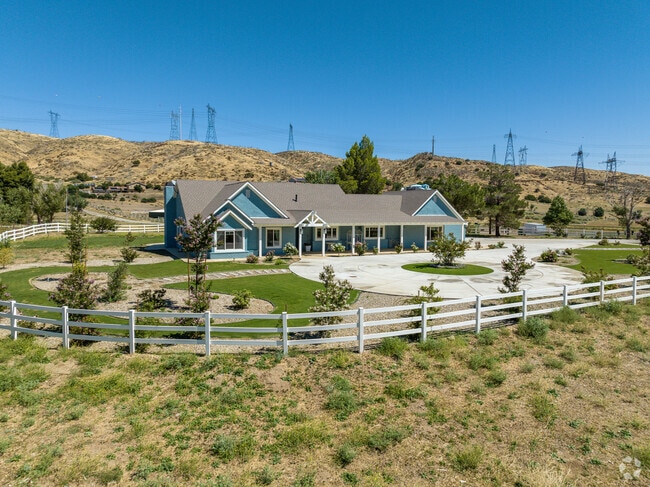 A fenced ranch property located in Leona Valley.