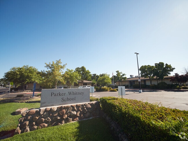 Parker Whitney Elementary School is in the Sunset Creekside neighborhood.