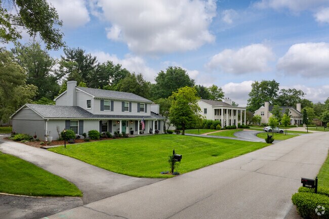 There are wide streets and no sidewalks in the Riverwood neighborhood.
