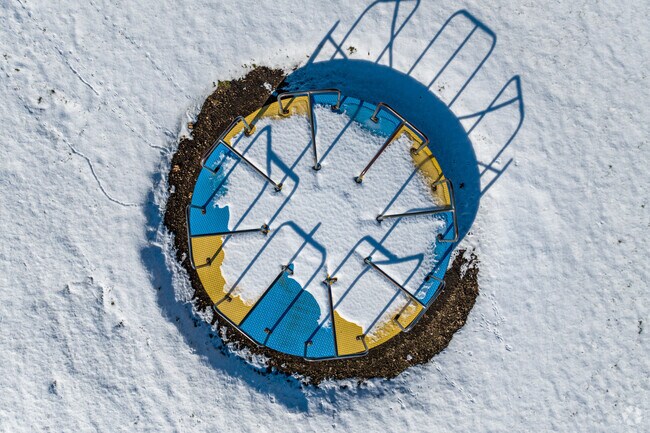 Feel like a kid again on the merry-go-round at Lisbon Creek Park.