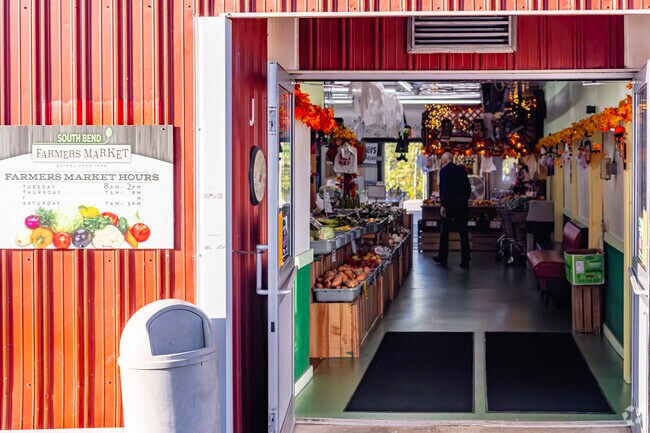Doorways at front and back parking enter to the two indoor halls of South Bend Farmers Market.