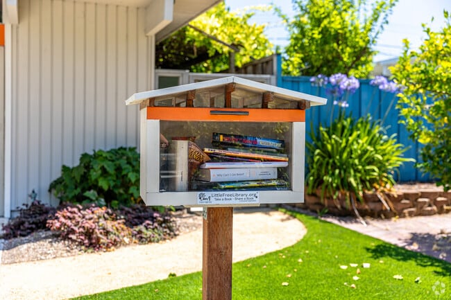 A mini library in Charleston Gardens conveys the positive neighborhood community.