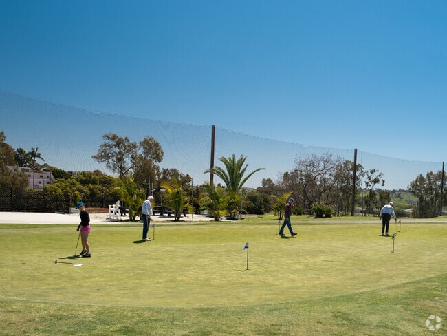 Practice your putting on the putting green at Emerald Isle Golf Course Oceana Oceanside.