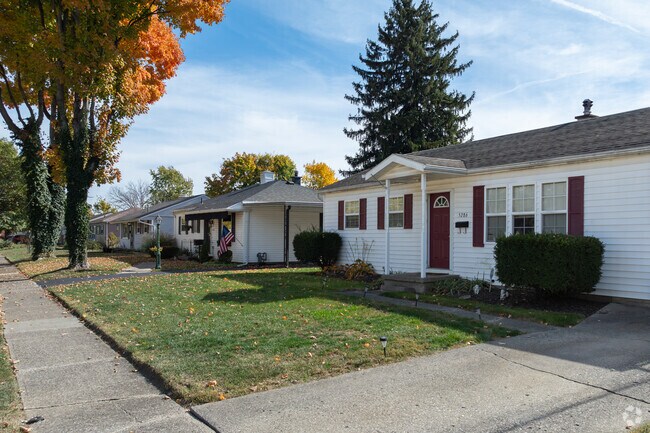 Eastmont offers homes close together with trim lawns and narrow driveways.