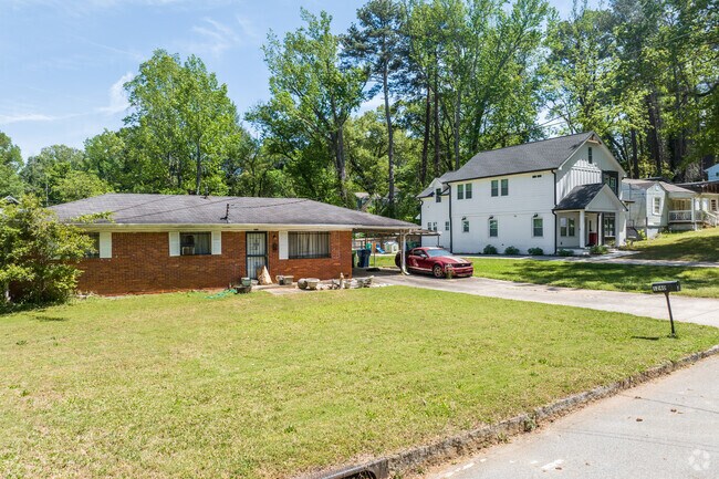 Cozy homes in Cascade Avenue offer wide front lawns and welcoming low-profile designs perfect for relaxed suburban living.