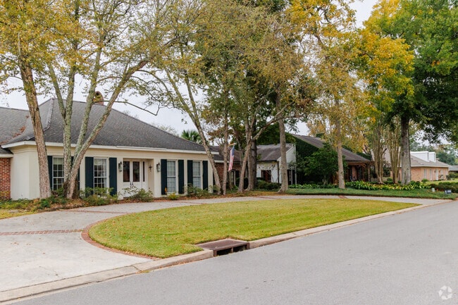 Located in Greenbrier, Acadian style home with large front driveway.