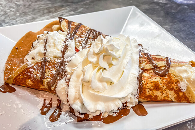 Enjoy a delicious banana crepes at the Prion breakfast club in Collins Estates.