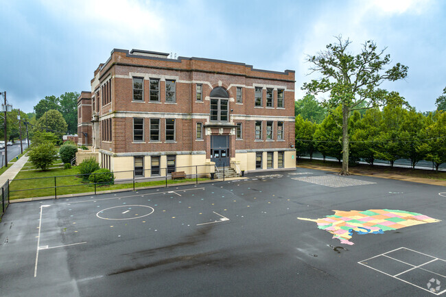 The playground and original school building at the Brayton School, Summit, NJ.
