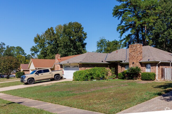 Wide driveways and front yards in the Jenkins - Pinecroft neighborhood.