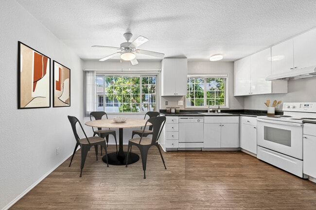 Kitchen and dining area with hard surface flooring