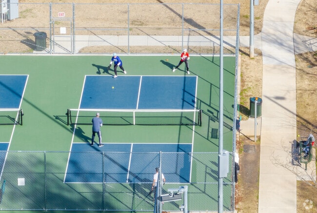 Cary Towne Center residents play casual pickleball matches at Walnut Street Park.