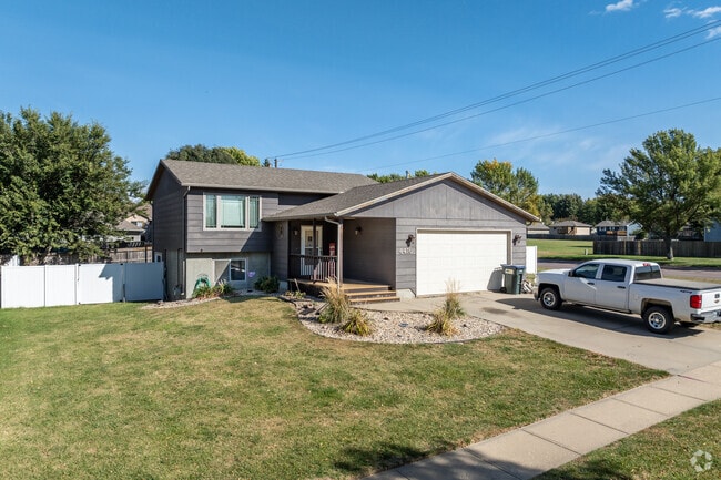 Most homes in the Pepper Ridge neighborhood feature two-car garages and large front yards.