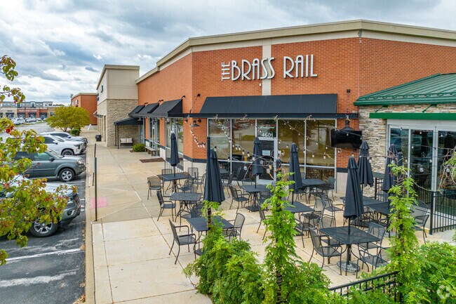 Dine in the gardenesque patio at The Brass Rail.