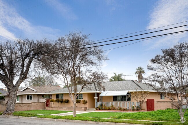 Ranch-style homes line Pomona Valley streets, offering single-level living and charm.