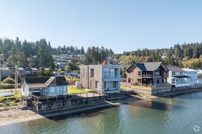 Modern homes are found alongside other homes on the waterfront in Utsalady.