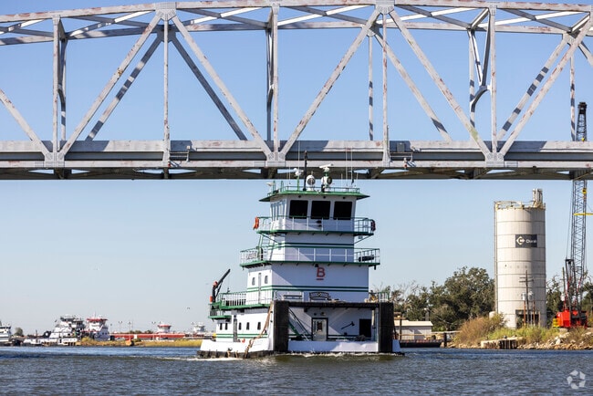 Tug boats move barges around the intercostal waterway just north of Cameron.