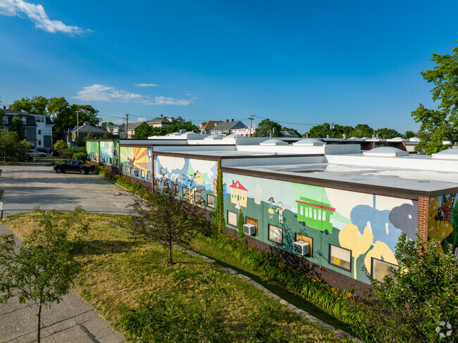 Each mural tells a story along the Vartan Gregorian Elementary School building.