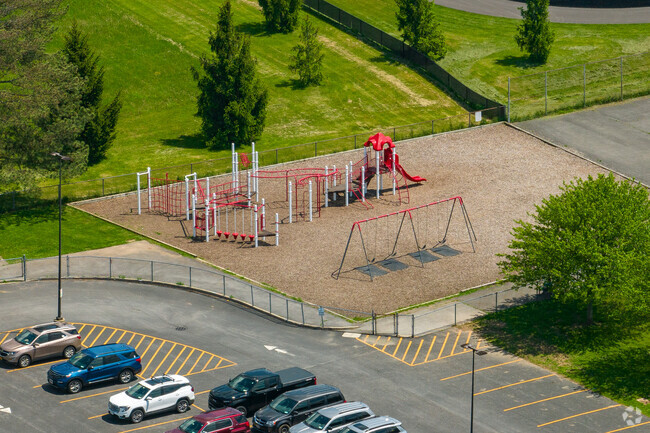 Edward R Andrews Elementary School features two playgrounds for students to play on.