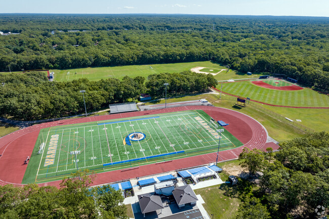 Play sports at Comsewogue High School.