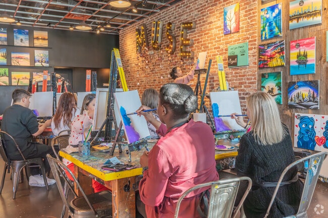 Have a few drinks while learning to paint at Muse Paint Bar in Garden City.