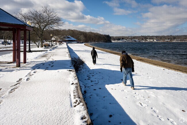 A snow stroll in Goddard Park, along the water's edge—serenity close to Western Cranston.
