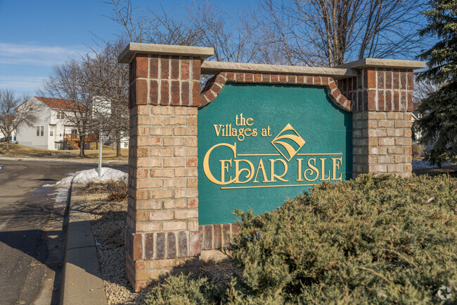 Signage welcomes people into the Cedar Isle neighborhood.