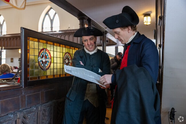 Reenactors dress the part for the Red Coat March of Leslies Retreat, one of the many historical events in Downtown Salem.