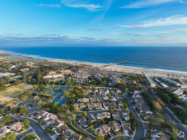 Collection of homes with ocean in background