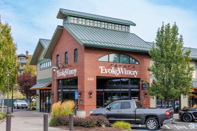 The Old Mill District attracts shoppers to boutiques and restaurants like Evoke Winery.
