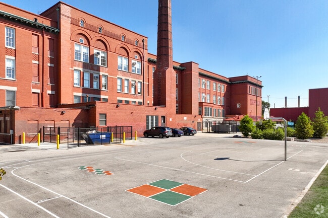 Young athletes enjoy the basketball courts at Nash Elementary School in the Austin neighborhood.