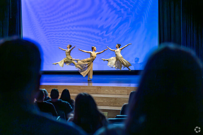 Dancers appear to float on stage at Reflections in Dance in Holladay.