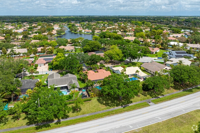 Several homes in Cypress Glen feature pools and big backyards.