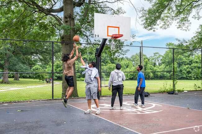 Play some basketball at Easterwood Park with friends in Coppin Heights.