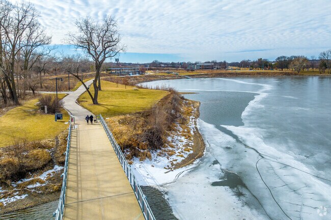 The paved walking path allows for easy walking and biking at MacRae Park in Great South Side.