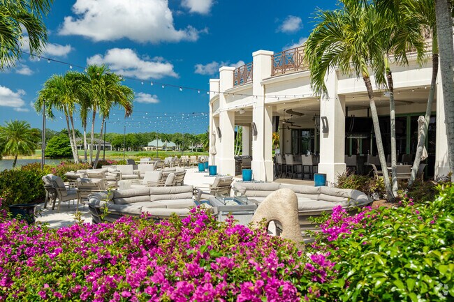 Quail West features lovely outdoor dining at the Cypress Grill in the clubhouse.