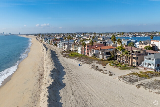 In the winter the sand is pushed into storm surge barriers on the beach.