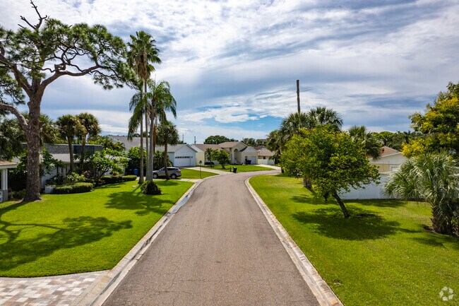 Drive along the streets of Maximo Moorings and you will see the well-manicured lawns.