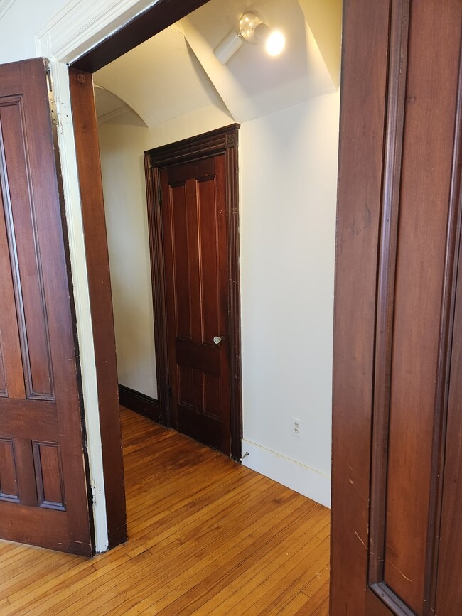 Hallway with storage closet