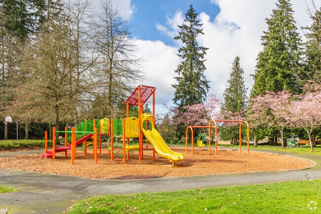 Spruce Hills Park has space to play on the playground and the adjacent basketball court.
