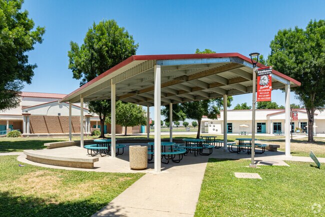 A covered lunch area at Strathmore Middle School is provided for students to eat.