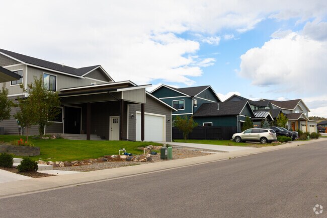 Modern traditional homes built after 2020 line this Silt street.