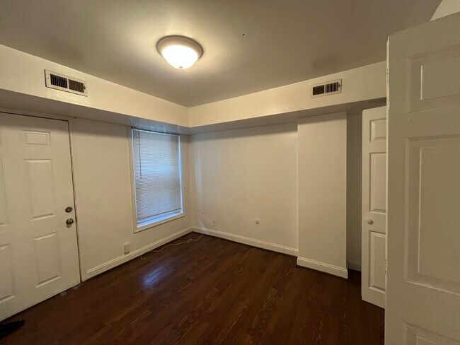Bedroom with walkout private backyard