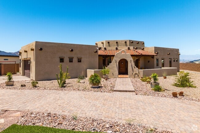 Pueblo style, Spanish-American architecture exists in custom, single family homes.