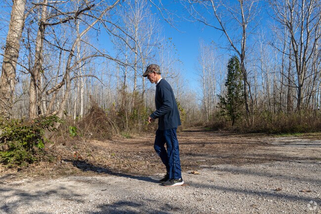 Most trails within River's Edge Park are unpaved.