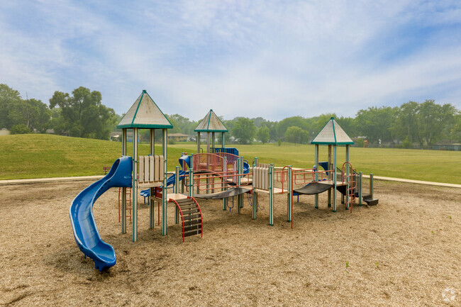 Salk Elementary School playground with blue slide, Schererville, IN.