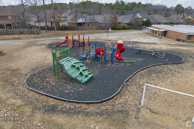 Students flock to the playground during recess at Baker Interdistrict Elementary School.
