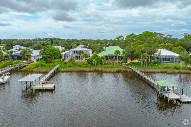 This row of homes in Turnbull Shores enjoy having direct water access.