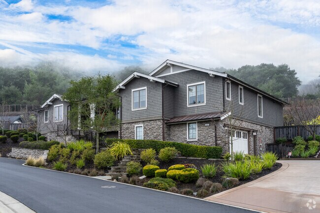 This two-story home in Oak Springs offers space and comfort in a serene setting.